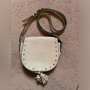 EUC Victoria’s Secret small saddle bag with tassles and gold studs